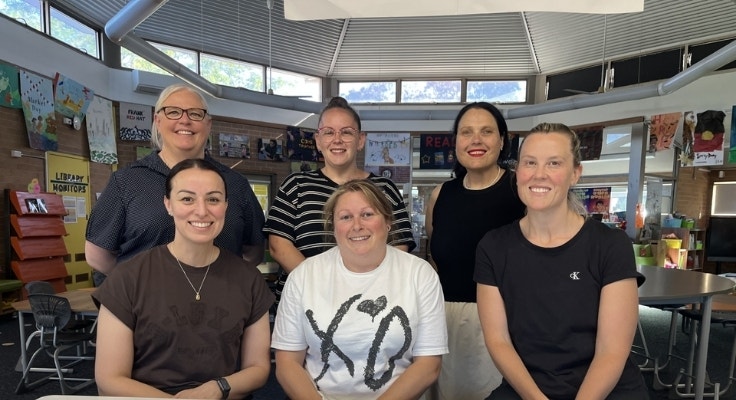 Our 2025 P&C posing for a photo after a meeting.